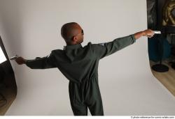 ERIC PILOT STANDING POSE WITH GUNS